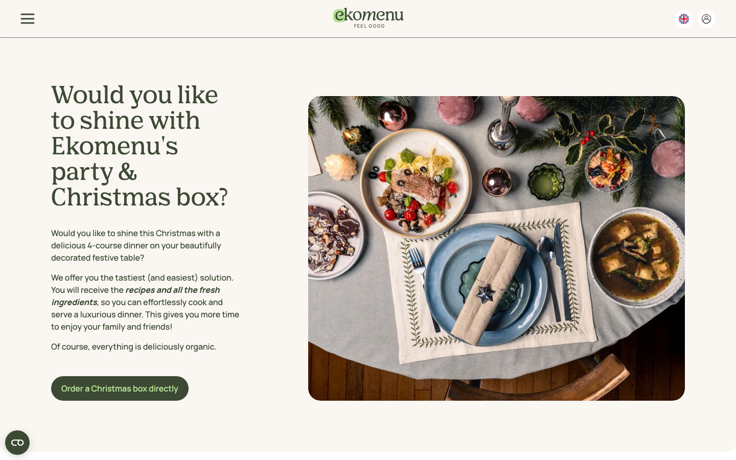 Screenshot van de Ekomenu kerstbox pagina met feestelijk gedekte tafel
