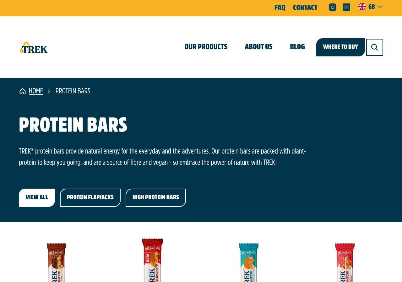 TREK's official UK site (eattrek.com) protein bars category page, showing the flapjack range and GB site flag.
