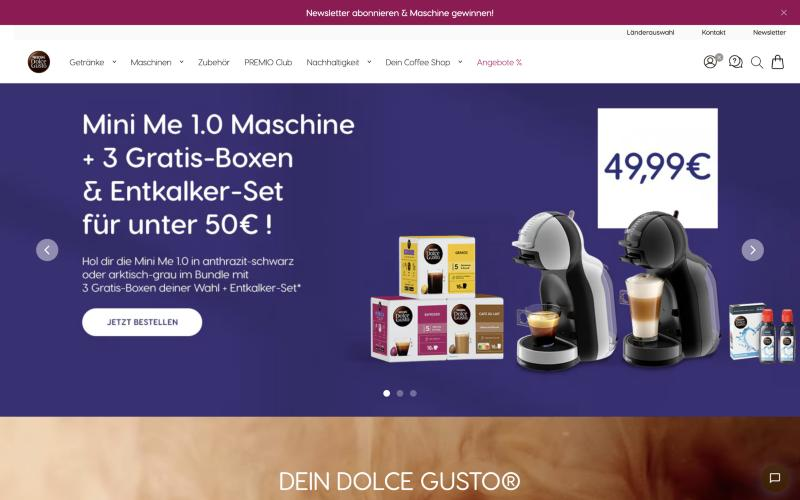 Startseite von Nescafé Dolce Gusto mit Kapselmaschine und Kapselboxen.